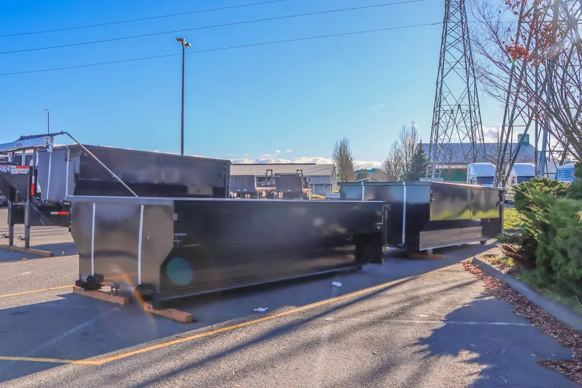 Roll-off dumpster ready for waste disposal at job site for Roofing Dumpster Rental in Winchester